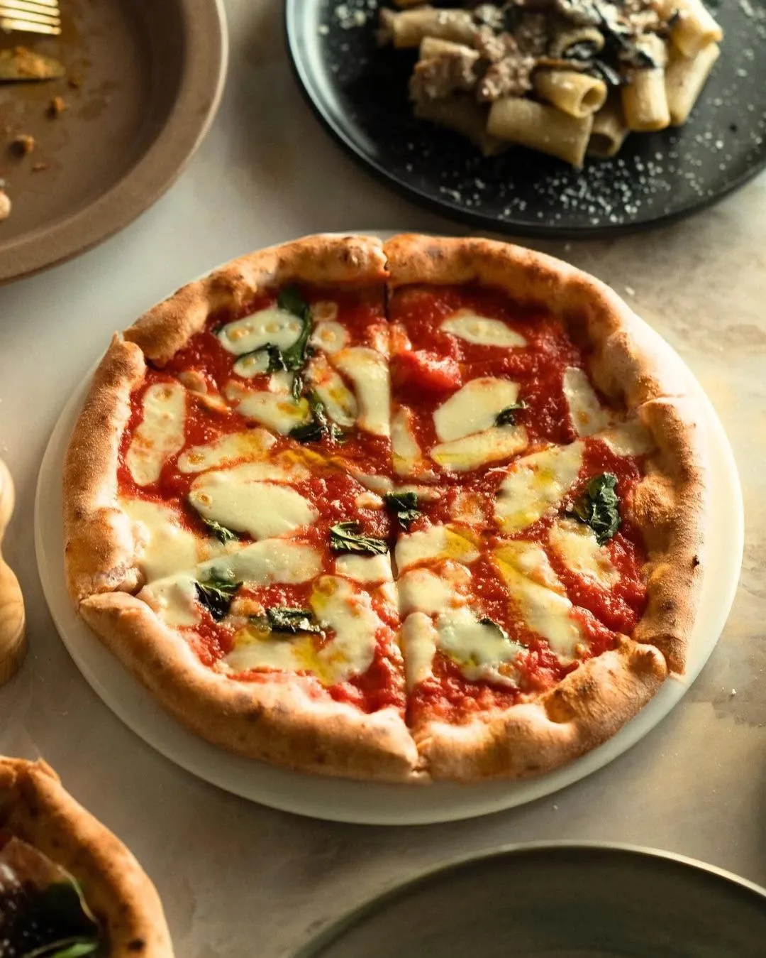 The Queen Margherita, San Marzano and fior di latte with a leopard-charred crust